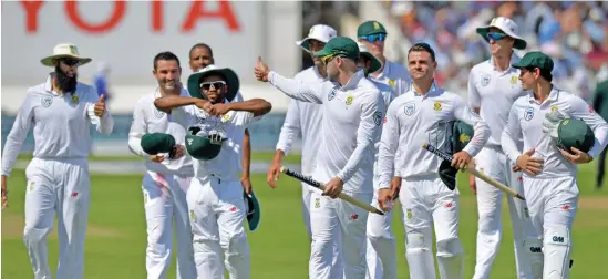  ?? (AFP) ?? South African captain Faf du Plessis (centre) leads his team off the field after defeating England in the second Test in Nottingham, UK, on Monday