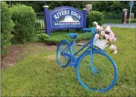  ?? Joseph B. Nadeau/The Call ?? Painted bicycles adorned with flowers — or art displays — like this one outside of Rivers Edge Recreation­al Complex, can be found in different parts of the city.
