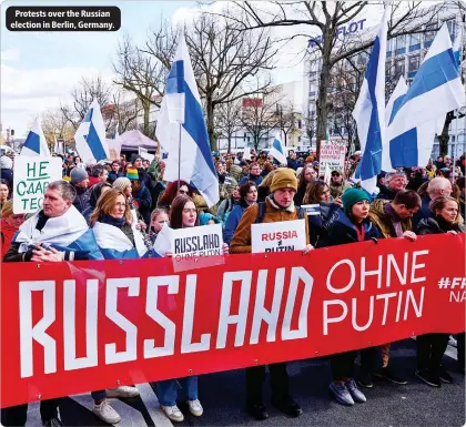  ?? ?? Protests over the Russian election in Berlin, Germany.