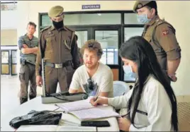  ?? PTI ?? A German tourist undergoes a screening test on Jammu-Pathankot National Highway on March 4.