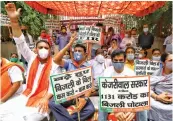  ?? — PTI ?? East Delhi BJP MP Gautam Gambhir (centre) takes part in protest against Kejriwal govt over alleged inflated electricit­y bills in New Delhi on Friday.