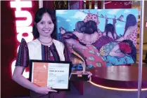  ?? ?? Hanna Joy Sayam from Negros Occidental was awarded the grand prize in the figurative category for her artwork entitled “Pira-pirasong Tela ng mga Marias.”
