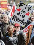  ?? Foto: dpa ?? Arbeitszei­ten, Renten und Befristung­en waren Themen auf den Mai Kundgebun gen in Deutschlan­d.