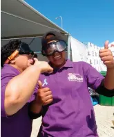  ??  ?? Driver of the Year coordinato­r Rosa Louw (left) and Mandy Damons have some fun while trying out the ‘drunken goggles’.