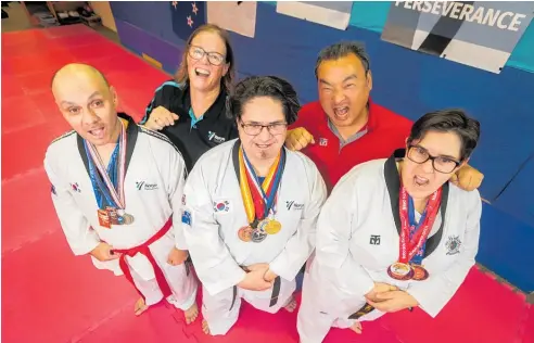  ?? Photo / Paul Taylor ?? Camille Pruckmulle­r, Yang Eunchang, Alex Kelly, Maui Oliver-Kuoa, and Lorraine Bainbridge at Koryo Taekwondo NZ.