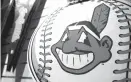  ?? ASSOCIATED PRESS FILE PHOTO ?? A Chief Wahoo logo is shown on a baseball at the Cleveland Indians shop in the team’s hometown. The controvers­ial logo is being removed from the Indians’ uniform next year.