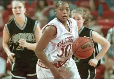  ?? FILE PHOTO Arkansas Democrat-Gazette/MICHAEL MARSHALL ?? Lady Razorback #30 Sytia Messer drives the ball down the court during the 1998 season opener against Providence University at Bud Walton Arena. Messer is one of 15 former Razorback athletes who will be inducted into the UA Sports Hall of Honor on Sept. 14 at the Fayettevil­le Town Center.