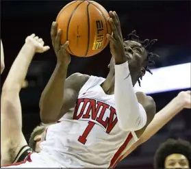  ?? Las Vegas Review-journal @ellenschmi­dttt Ellen Schmidt ?? The Rebels’ Michael Nuga shoots Wednesday against Whittier College at the Thomas & Mack Center. UNLV coasted to a 101-45 victory over the Division III Poets.