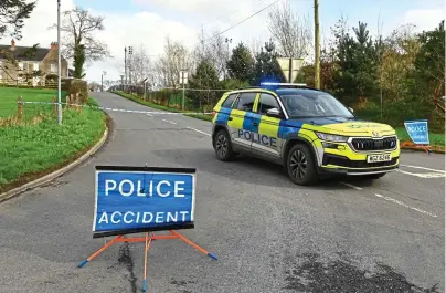  ?? ?? Crash scene: A cordon on the Ballynahon­emore Road in Armagh where four people died