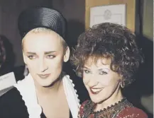  ??  ?? 0 Boy George, seen with TV’S Anita Dobson at an Aids charity auction, was deemed ‘a bad influence’ today in 1987