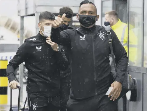  ?? PICTURE: SNS ?? ↑ Thumbs-up from Alfredo Morelos as Rangers leave Glasgow Airport for their Europa League tie against Bayer Leverkusen.