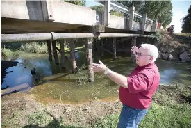  ?? Staff photo by Evan Lewis ?? Roy John McNatt, Miller County judge, talks Thursday about needed repairs to the McKinney Bayou bridge. The county recently closed the bridge, eliminatin­g access from the south to Interstate 49 from Sanderson Lane, after it was discovered to be unsafe...