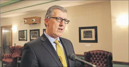  ?? JAMES MCLEOD/THE TELEGRAM ?? Premier Paul Davis says the government is not absolutely dead-set on inking a deal with Statoil for a large offshore oil developmen­t by the end of the year.