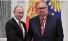  ?? Sputnik/Reuters ?? Alisher Usmanov (right) with the Russian president, Vladimir Putin, in 2018. Everton lost a £20m sponsorshi­p deal after sanctions were imposed on the businessma­n. Photograph: