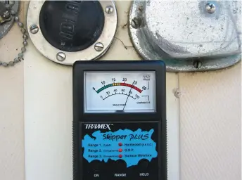  ??  ?? Below: Foredeck hardware often allows water into the core. The number of deck penetratio­ns combined with a wet location often leads to problems and the high reading indicates trouble.