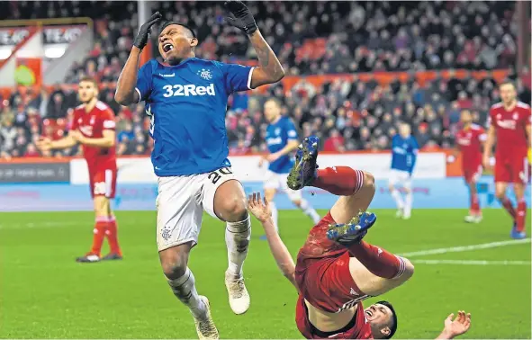  ??  ?? Not for the first time this season, Rangers striker Alfredo Morelos and Aberdeen defender Scott McKenna clashed on Wednesday night.