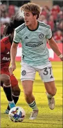  ?? USA Today Sports - John E. Sokolowski ?? Atlanta United midfielder Aiden Mcfadden controls the ball during last Saturday’s game against Toronto FC.