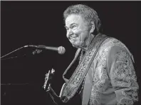  ?? AP PHOTO ?? Roy Clark, the guitar virtuoso and singer who headlined the TV show “Hee Haw” for nearly a quarter century has died. He was 85.