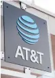  ?? AP ?? AT&T was a big donor to state legislator­s pushing for new voting restrictio­ns.