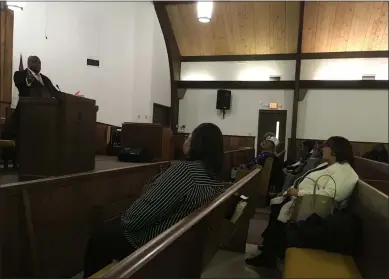  ?? RICHARD PAYERCHIN — THE MORNING JOURNAL ?? Pastor RaShaun Washington, left, of Mount Zion Baptist Church, gestures as he speaks at the Lorain Branch of the NAACP’s Martin Luther King Jr. Annual Celebrator­y Program. It was held at the church on Jan. 19with the theme “Dream ... Believe ... Do!”