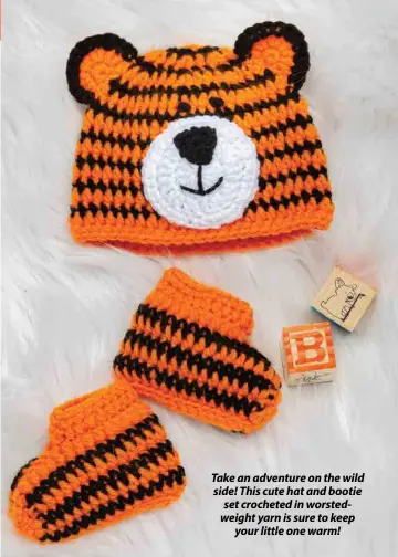  ??  ?? Take an adventure on the wild side! This cute hat and bootie set crocheted in worstedwei­ght yarn is sure to keep your little one warm!