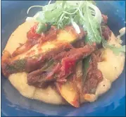  ?? BAY AREA NEWS GROUP ?? A summer ragout with tomatoes, squash and peppers atop polenta can be found on the inaugural Banks & Braes menu at the State Street Market in Los Altos.