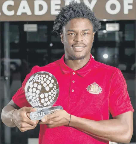  ??  ?? Sunderland’s Josh Maja with the EFL Young Player of the Month award for August where he scored five goals.