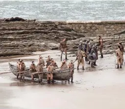  ??  ?? GAME OF THRONES – Extras carry a boat during the shooting of the seventh season of the television series ‘Game of Thrones’ at the beach of Itzurun in Zumaia, Spain, in October, 2016. ‘GOT’ ended its run after eight epic years Sunday. (EPA)