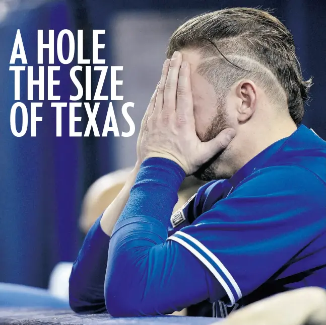  ?? Nathan Denette / THE CANADIAN PRESS ?? Josh Donaldson’s reaction in the 11th inning sums up the team’s current situation. The Jays head to Texas to play Game 3 on Sunday night.