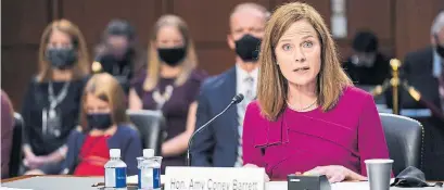  ?? PATRICK SEMANSKY THE ASSOCIATED PRESS POOL ?? U.S. Supreme Court Justice nominee Judge Amy Coney Barrett appeared before the Senate judiciary committee Monday. The hearing is expected to be contentiou­s with possible questions about how her Catholicis­m would guide her judgment.