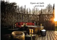  ??  ?? Open-air bath and deck
