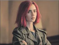  ?? CP PHOTO ?? Lily Collins, shown in this undated handout image, says she’s long been fascinated with food documentar­ies and mindful about what she puts on her plate.