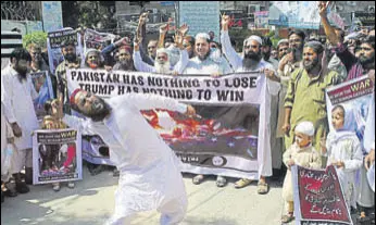  ??  ?? A protester chants slogans against the United States during a rally in Hyderabad, Pakistan, on Friday. Pakistan's political and military leaders have rejected President Donald Trump's allegation that Islamabad is harbouring militants who battle US...