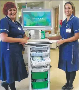  ?? Picture: East Kent Hospitals University NHS Foundation Trust ?? Jennifer Jewell with colleague Carrie Merry, acting chemothera­py unit manager, and one of the treatment units
