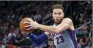  ?? CARLOS OSORIO — THE ASSOCIATED PRESS ?? Detroit Pistons forward Blake Griffin makes a layup during the second half of an NBA basketball game, Saturday in Detroit.