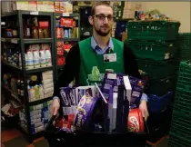  ??  ?? Kyle at the North West foodbank which will help out families