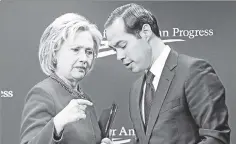  ??  ?? Hillary Clinton talks with Julian Castro — now HUD secretary and her most likely running mate— in March.