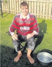  ??  ?? Chilled out Tom Greatrex MP nominated Fulham FC boss Felix Magath after his ice bucket challenge