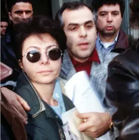  ?? Pa News/PA ?? Patrizia Reggiani being taking to prison by inspector Carmine Gallo, January 1997. Photograph:
