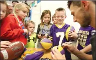  ?? JERRY HOLT/TRIBUNE NEWS SERVICE ?? Minnesota Vikings kicker Blair Walsh thanked first graders at Northpoint Elementary School for writing letters of encouragem­ent to him after he missed a 27-yard field goal in a loss to Seattle on Jan. 14.