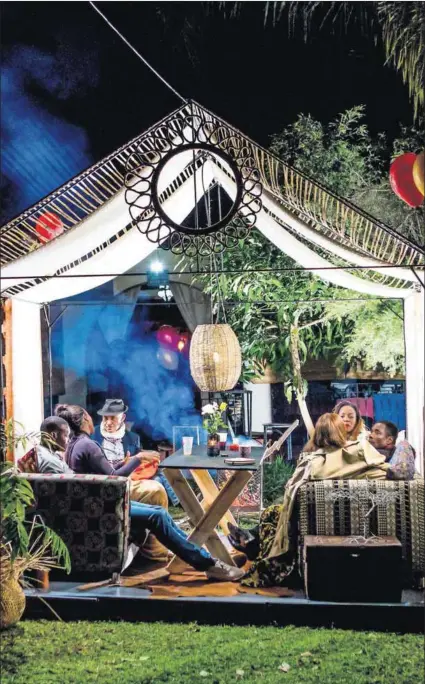  ??  ?? Class divide: Exclusive African designs and cuisine hold sway at a new Harare spot. The ‘rich kids’ are caught between enjoying the good life, respecting their roots and the reality of the impoverish­ed masses. Photo: Tinashe Njagu