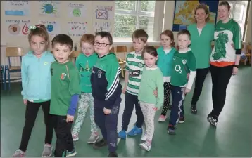  ??  ?? Irish dancers, Kayla, Faolán, Ella, Ruairí, Bill, Quin, Roisin, Bobby, Norma Doyle (principal) and Pamela Denton (deputy principal) at the Seachtain na Gaeilge celebratio­ns in Clonroche National School.