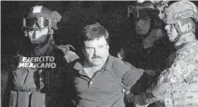  ?? AP ?? Joaquin Guzman is escorted by soldiers in January after he was recaptured from breaking out of prison in Mexico. A judge said Monday that Guzman’s extraditio­n to the U.S. can move ahead.