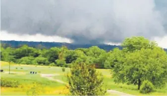  ?? Connie Burcham, The Ada News ?? A tornado touches down near Francis, Okla., in 2015. As of Friday, Oklahoma had yet to have a tornado touch down in the state, marking the latest “first” tornado of a year since 1962.