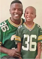  ?? COURTESY OF LEROY BUTLER ?? LeRoy Butler and his youngest child, LeRoy IV, don a familiar jersey.