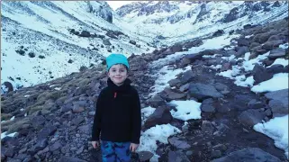  ?? ABOVE: LEFT: ?? Young Joshua Davison pictured on the climb up the Moroccan summit of Toubkal which he reached last Tuesday morning, November 7.