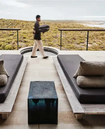  ??  ?? Below: the terrace at Southern Ocean Lodge. Opposite, clockwise from top left: McLeod Hill lookout in the Flinders Ranges; Kangaroo Island marron and abalone with native bush fruits and coastal herbs served at Southern Ocean Lodge, and the waiting area...