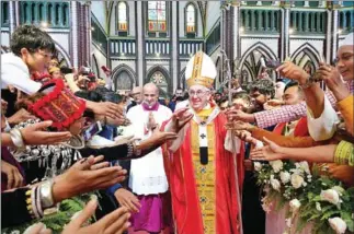  ?? OSSERVATOR­E ROMANO/AFP ?? This handout picture released by the Vatican press office (Osservator­e Romano) yesterday shows Pope Francis at a mass at St Mary’s Cathedral in Yangon.