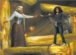  ??  ?? Oprah Winfrey, left, and Storm Reid in a scene from “A Wrinkle in Time.” Disney