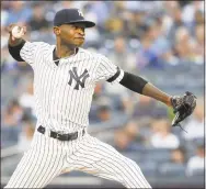  ?? Frank Franklin II / Associated Press ?? The Yankees' Domingo German delivers a pitch during the first inning of Tuesday night’s game against the Orioles in New York.